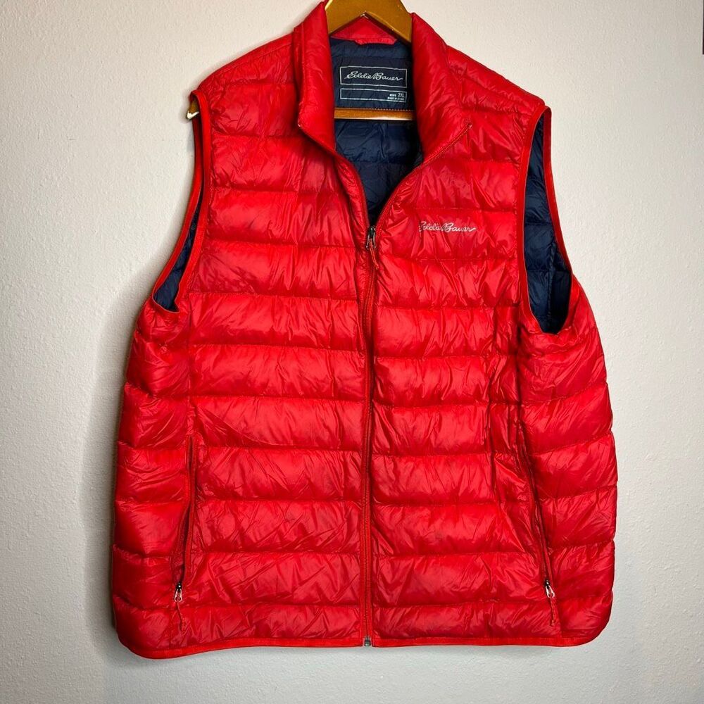 Eddie Bauer red men's down puffer vest featuring a full-zip front and horizontal